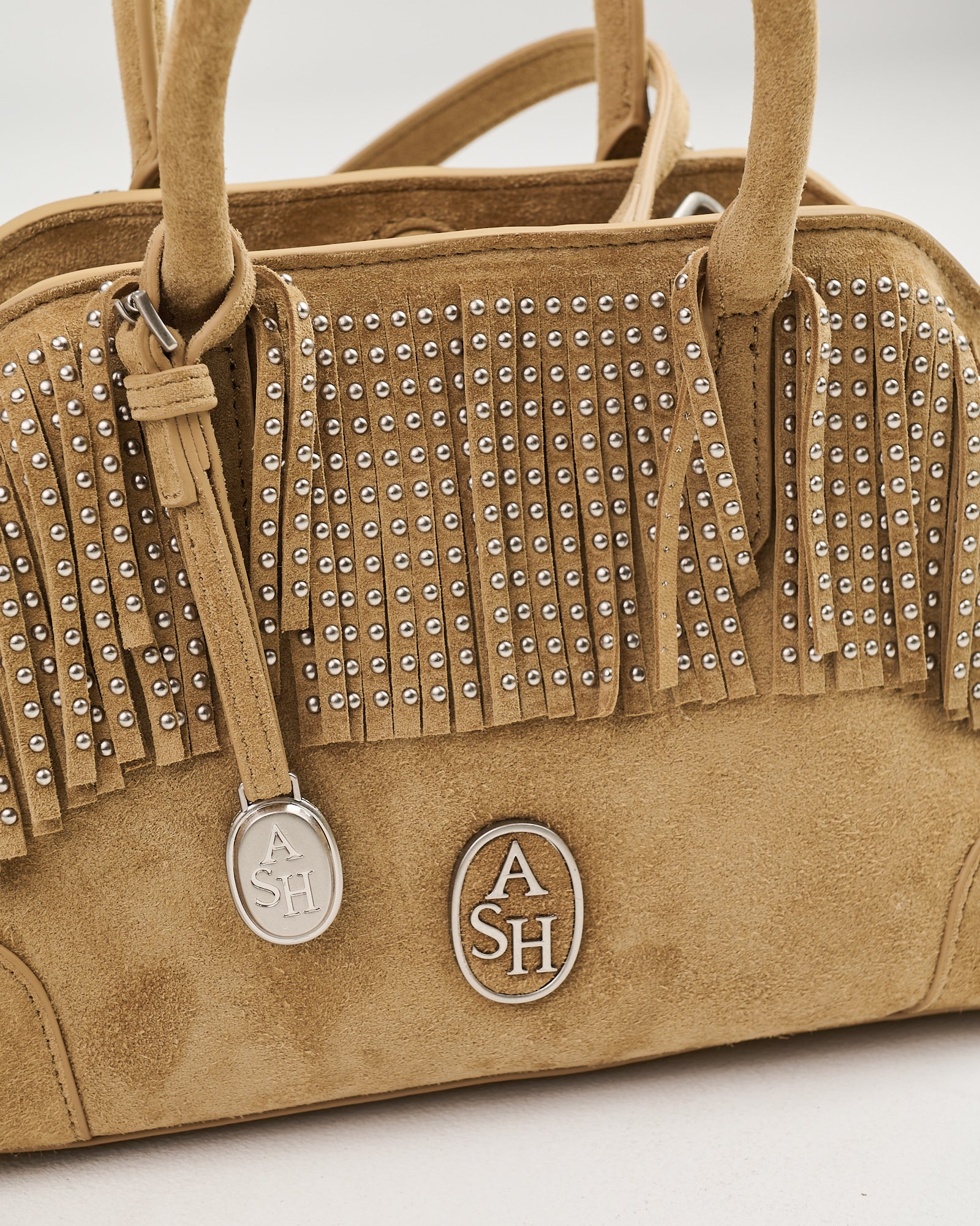 Borsa Ash in suede con frange e borchie green