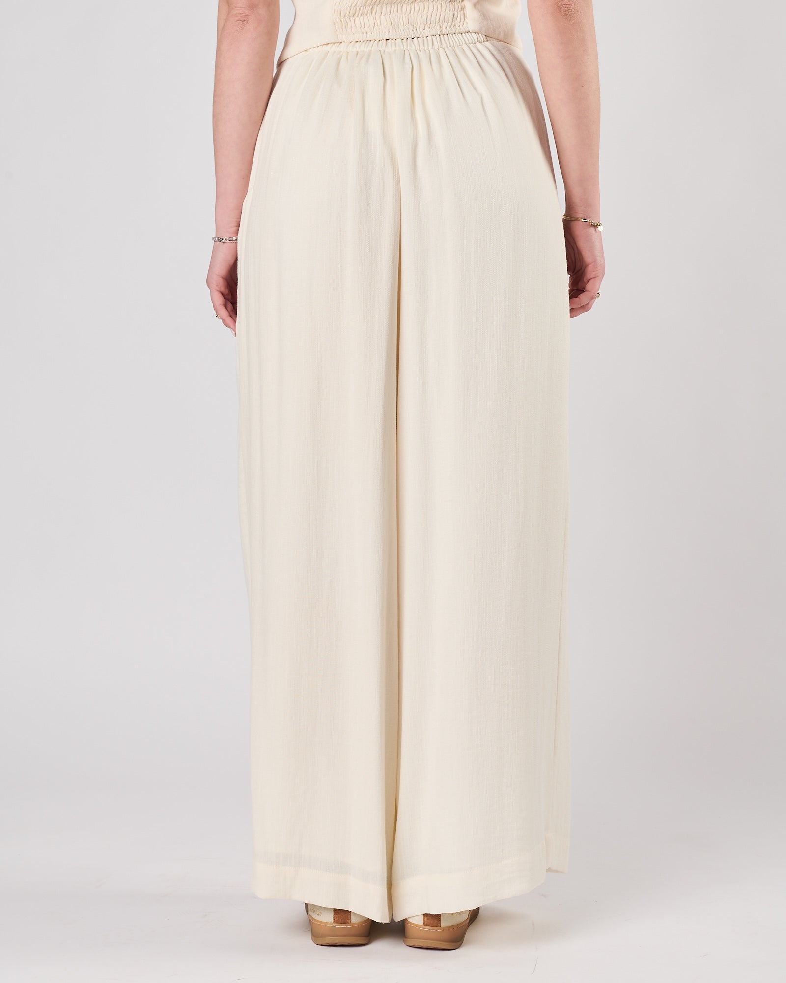 Pantalone Eleh con pieghe panna