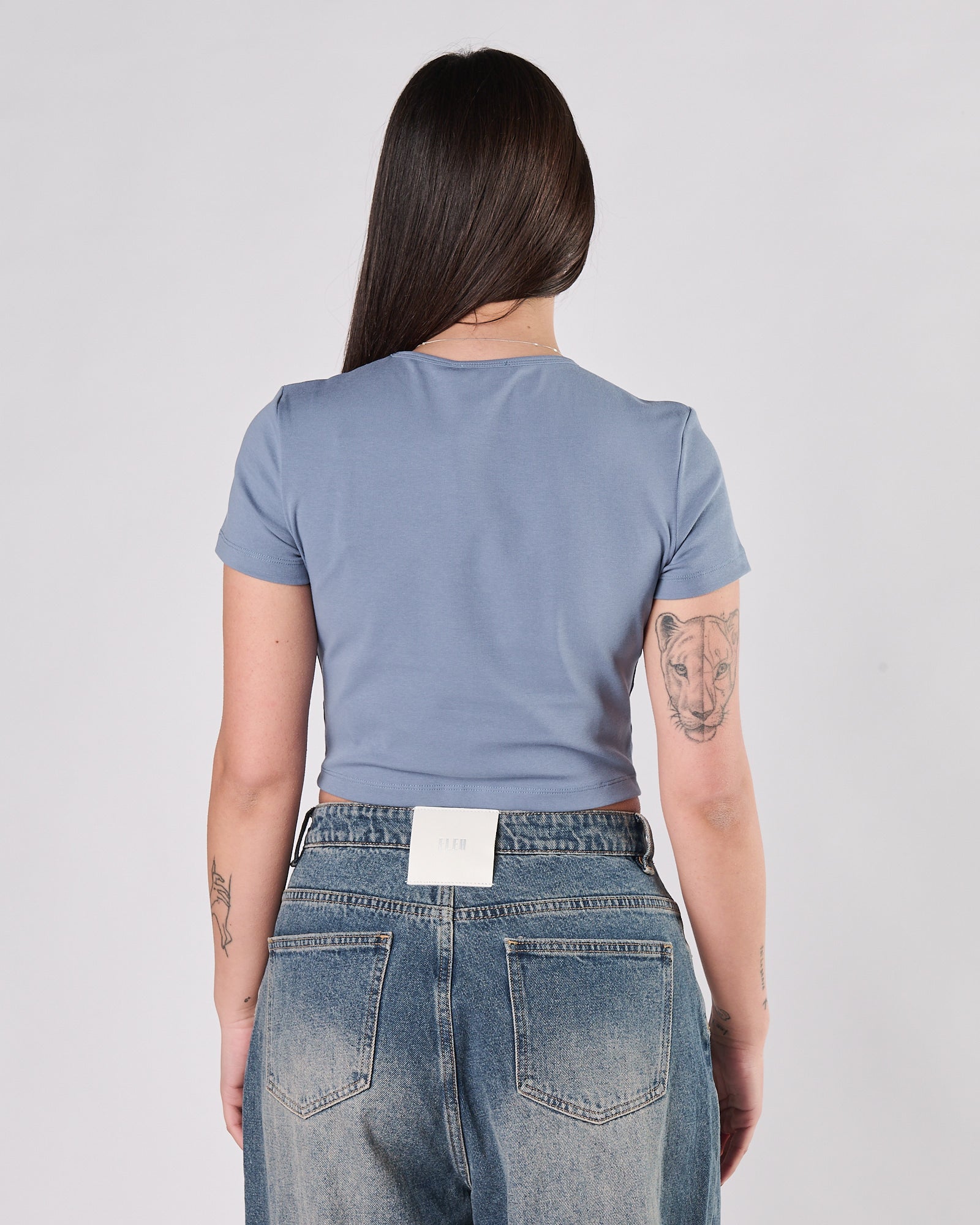 T-shirt Eleh corta celeste con scritta