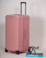 Pink 4-wheel trolley