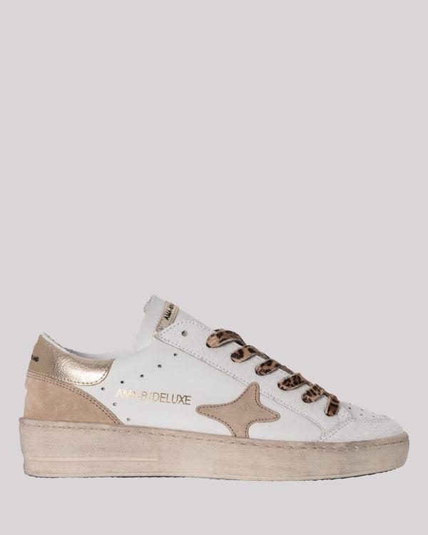 Cream and gold sneakers