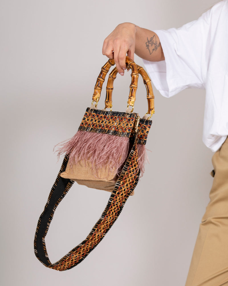 Handbag with feathers