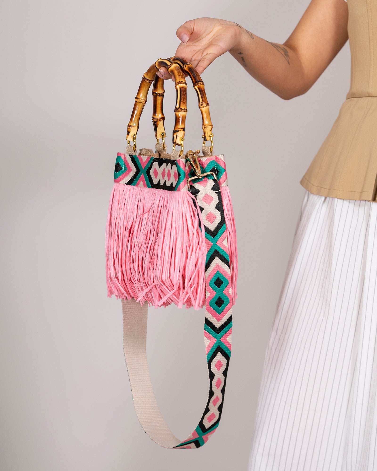 Handbag with pink fringes