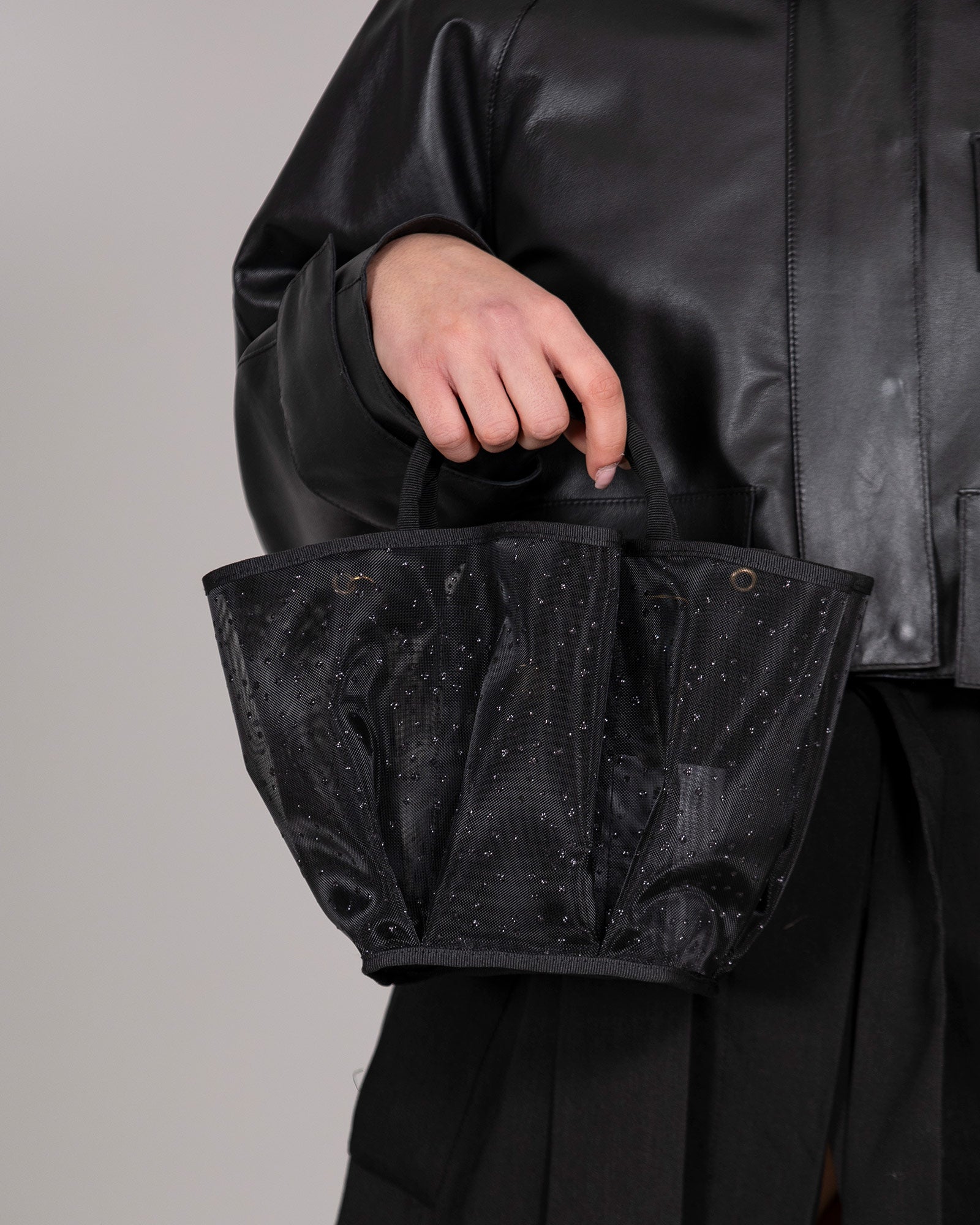 Black semi-transparent handbag