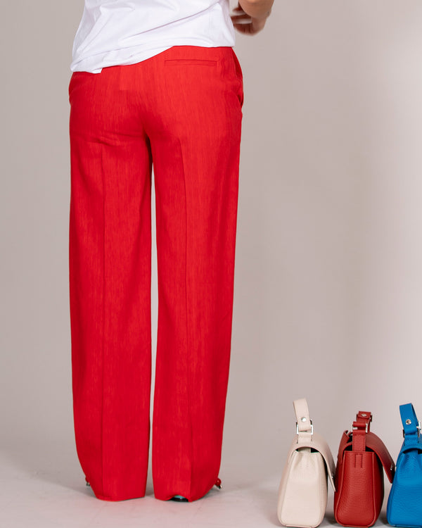 Red pleatless trousers
