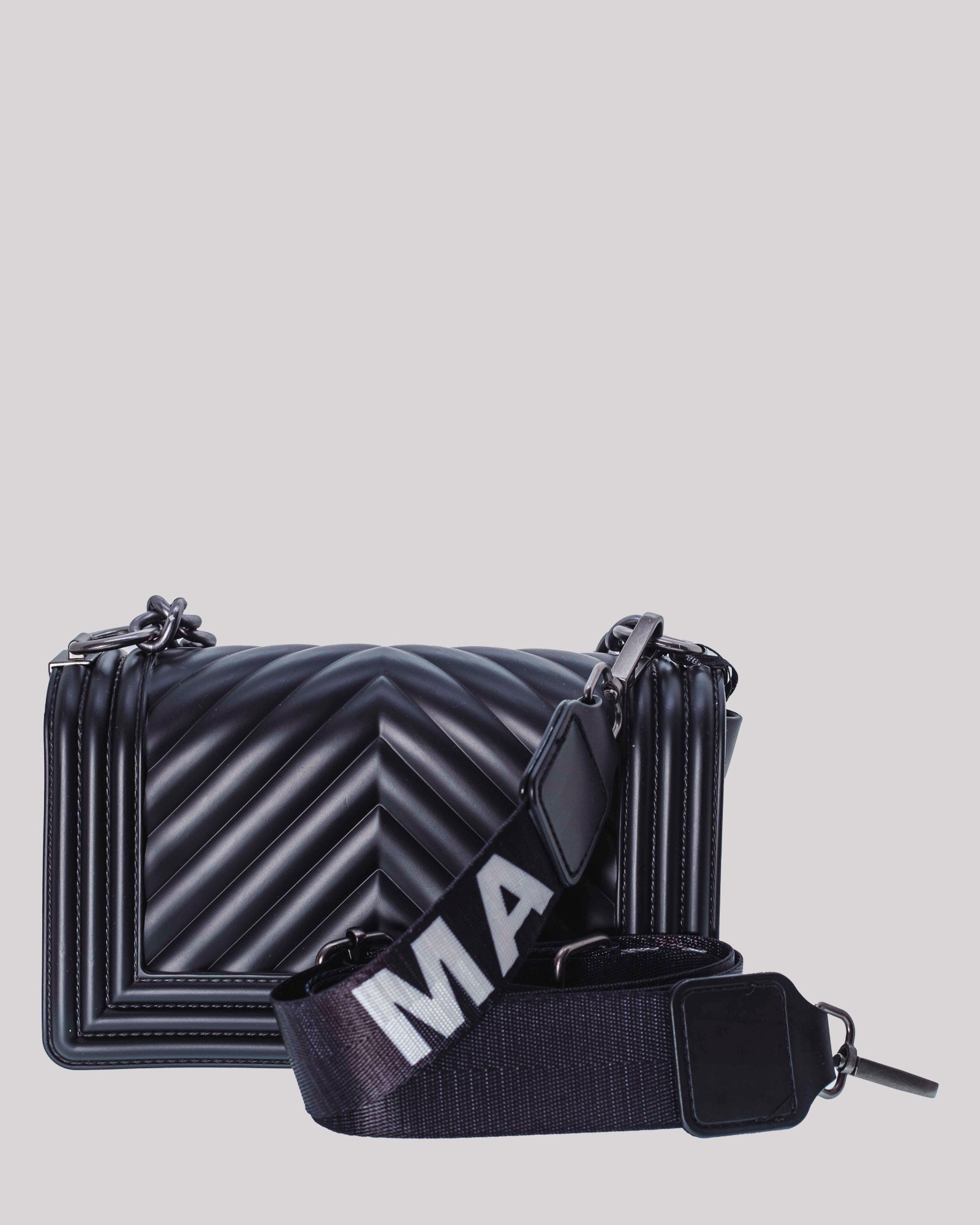 Bag with black shoulder strap