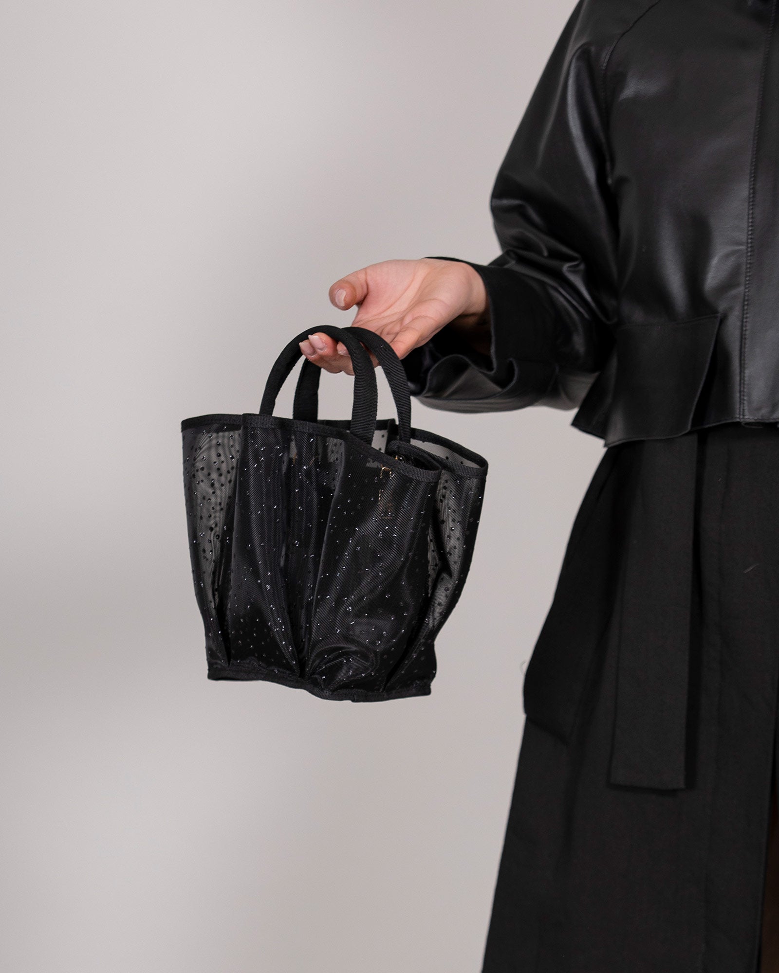 Black semi-transparent handbag